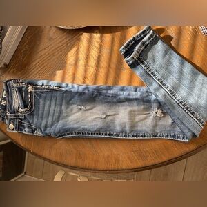 Distressed Blue Jeans